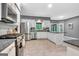Modern kitchen with stainless steel appliances and ample counter space at 120 Hermitage Pl, Peachtree City, GA 30269