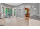 Stylish kitchen with tile flooring, access to the backyard, and a modern design at 120 Hermitage Pl, Peachtree City, GA 30269