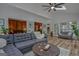Bright living room boasts hardwood floors, skylights and comfortable seating at 120 Hermitage Pl, Peachtree City, GA 30269