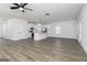 Bright and airy kitchen featuring a central island, stainless steel appliances, and stylish pendant lighting at 432 Cantrell Drive, Dallas, GA 30157