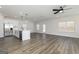 Open floor plan featuring a modern kitchen with a central island and stainless steel appliances at 432 Cantrell Drive, Dallas, GA 30157