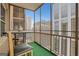 Balcony featuring a table and chairs with stunning city views at 300 Peachtree Ne Ave # 22N, Atlanta, GA 30305