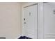 Hallway with apartment entry door featuring secure access at 300 Peachtree Ne Ave # 22N, Atlanta, GA 30305