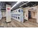 Well-lit laundry room featuring modern washer and dryer units, and ample space for residents to conveniently take care of laundry at 300 Peachtree Ne Ave # 22N, Atlanta, GA 30305