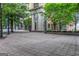 Outdoor archway with a tiled ground and visible city environment, offering an inviting and architecturally interesting landmark at 300 Peachtree Ne Ave # 22N, Atlanta, GA 30305