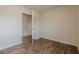 Bedroom with open closet and hard surface floors at 4806 Rockbridge Rd, Stone Mountain, GA 30083