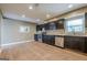 Spacious kitchen with stainless steel appliances and dark cabinetry at 4806 Rockbridge Rd, Stone Mountain, GA 30083