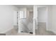 Upstairs hallway showcasing neutral colors, carpet flooring, and white trim at 412 Cantrell Drive, Dallas, GA 30157