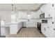 Modern kitchen featuring white cabinets, stainless steel appliances, and ample counter space at 412 Cantrell Drive, Dallas, GA 30157