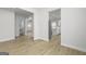 Bright living room with views of the kitchen, offering an open and connected living space at 412 Cantrell Drive, Dallas, GA 30157