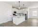 Modern kitchen featuring white cabinets, a center island, and stainless steel appliances at 446 Cantrell Drive, Dallas, GA 30157