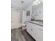 Bright bathroom featuring a granite countertop and a shower/tub combo with white accents at 140 Braymoor Cir, Fayetteville, GA 30215
