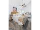 Comfortable bedroom featuring plush carpeting, soft natural light, and a sloped ceiling at 140 Braymoor Cir, Fayetteville, GA 30215