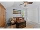 Inviting bonus room with vaulted ceilings, a ceiling fan, and comfortable seating at 140 Braymoor Cir, Fayetteville, GA 30215