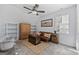 Inviting bonus room with vaulted ceilings, a ceiling fan, and comfortable seating at 140 Braymoor Cir, Fayetteville, GA 30215