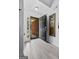Inviting foyer featuring neutral walls, tile floors, and an open doorway at 140 Braymoor Cir, Fayetteville, GA 30215