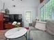 Comfortable living room with neutral tones, wood flooring, and natural light at 140 Braymoor Cir, Fayetteville, GA 30215