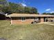 Brick home featuring a green lawn with an outdoor grilling area in the backyard at 140 Se Mount Zion Rd # 41, Atlanta, GA 30354
