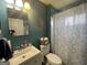 Stylish bathroom featuring a patterned shower curtain and modern fixtures at 140 Se Mount Zion Rd # 41, Atlanta, GA 30354