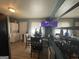 Cozy dining area featuring a round table, mirrored wall, and views of laundry and other rooms at 140 Se Mount Zion Rd # 41, Atlanta, GA 30354