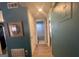 Well-lit hallway with tile flooring leading to the bathroom and other rooms at 140 Se Mount Zion Rd # 41, Atlanta, GA 30354