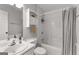 Bathroom with a vanity and a shower/bathtub combo at 75 Mcintosh Estates Dr, Sharpsburg, GA 30277