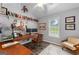 Spacious home office with built in desk and shelves at 75 Mcintosh Estates Dr, Sharpsburg, GA 30277