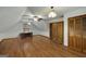 Large bonus room featuring hardwood floors, a desk, natural light and wooden furniture at 100 Hartford Pl, Fayetteville, GA 30214