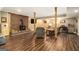 Finished basement with a wood-burning stove, cozy seating, and a wood-paneled accent wall at 165 White Rose Ln, Temple, GA 30179