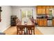 Traditional dining room featuring a large window and classic wood cabinets at 165 White Rose Ln, Temple, GA 30179