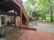 Outdoor patio with stairs, stone flooring, and garden area perfect for entertaining guests at 80 Jacksons Vly, Sharpsburg, GA 30277
