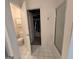 Bright and airy bathroom with a walk-in closet, toilet, and glass enclosed shower at 80 Jacksons Vly, Sharpsburg, GA 30277