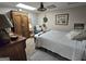 Comfortable bedroom featuring neutral decor, an armoire, and natural light at 80 Jacksons Vly, Sharpsburg, GA 30277