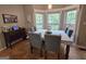 Cozy dining area with hardwood floors, a large window, and comfortable seating at 80 Jacksons Vly, Sharpsburg, GA 30277