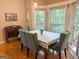 Charming dining area with natural light and hardwood flooring at 80 Jacksons Vly, Sharpsburg, GA 30277