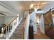 Elegant foyer featuring a staircase with wooden banisters and an open landing at 80 Jacksons Vly, Sharpsburg, GA 30277