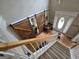 Entryway includes wood barn doors on sliders, staircase and hardwood flooring at 80 Jacksons Vly, Sharpsburg, GA 30277