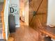 A beautifully decorated foyer with hardwood floors and a charming barn door at 80 Jacksons Vly, Sharpsburg, GA 30277