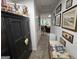 Hallway featuring wall decor and leading to a comfortable living area at 80 Jacksons Vly, Sharpsburg, GA 30277