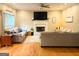 Spacious living room featuring a cozy fireplace, ceiling fan, and natural light at 80 Jacksons Vly, Sharpsburg, GA 30277