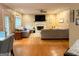 Bright living room with a fireplace, large windows, and comfortable seating at 80 Jacksons Vly, Sharpsburg, GA 30277