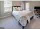 This bedroom features a door to the outside, carpeted floor, and a bed at 360 Hayden Cir, Woodstock, GA 30189