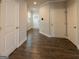 Entryway with hardwood floors and white doors at 360 Hayden Cir, Woodstock, GA 30189