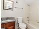 Bathroom with a granite vanity and shower-tub combo at 8091 Bouldercrest Pl, Douglasville, GA 30135