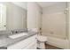 Bathroom with a granite vanity and shower-tub combo at 8091 Bouldercrest Pl, Douglasville, GA 30135
