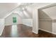 Bright bedroom features hardwood floors, natural lighting, and a closet at 3979 Doral Cir, Atlanta, GA 30360