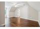 Spacious bedroom featuring hardwood floors, neutral paint, and a ceiling fan at 3979 Doral Cir, Atlanta, GA 30360