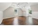 Bonus room with dark hardwood floors and natural light from 2 windows at 3979 Doral Cir, Atlanta, GA 30360