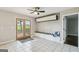 Living room with tile floors and bench seating looking out to the backyard at 3979 Doral Cir, Atlanta, GA 30360