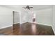 Hardwood floors accent this spacious living area with neutral colors at 3979 Doral Cir, Atlanta, GA 30360